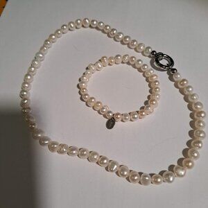 Tocara fresh water pearl necklace, bracelet and earing set with bag